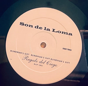 Son De La Loma – Blindman's Gift / Regalo Del Ciego