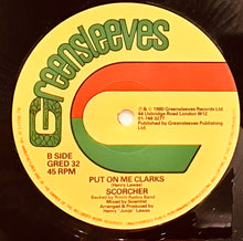 Cargar imagen en el visor de la galería, Barrington Levy / Scorcher– Sister Carol / Put On Me Clarks
