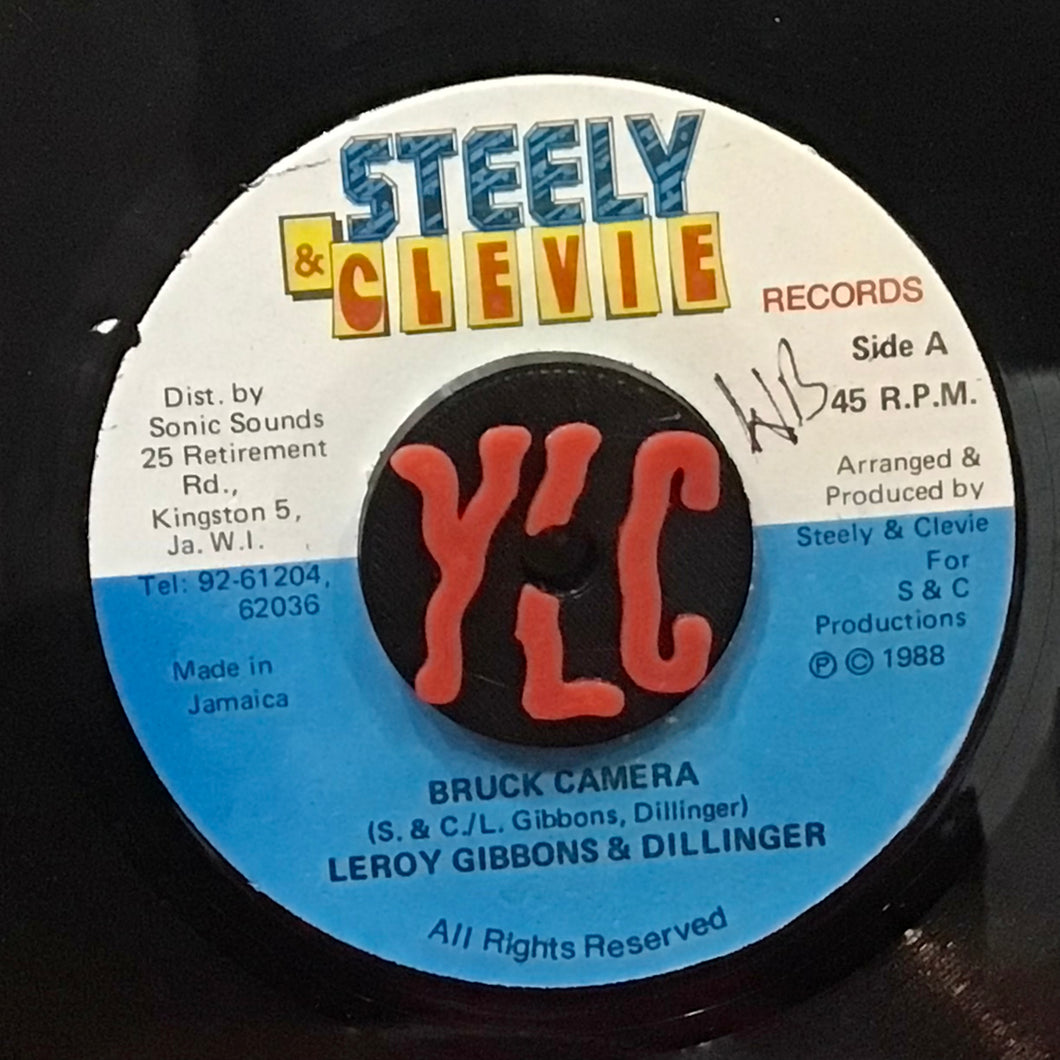 Leroy Gibbons & Dillinger – Bruck Camera